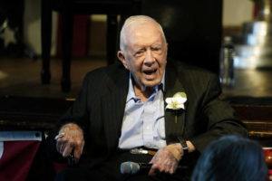 POOL / AP / 2021
                                FILE - Former President Jimmy Carter reacts as his wife Rosalynn Carter speaks during a reception to celebrate their 75th wedding anniversary Saturday, July 10, 2021, in Plains, Ga.