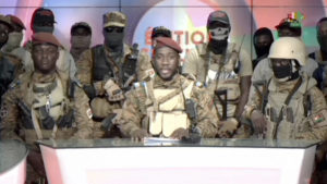 RTB / AP
                                In this image from video broadcast by RTB state television, coup spokesman Capt. Kiswendsida Farouk Azaria Sorgho reads a statement in a studio in Ougadougou, Burkina Faso, on Friday evening, Sept. 30. Members of Burkina Faso’s army seized control of state television late Friday, declaring that the country’s coup leader-turned-president, Lt. Col. Paul Henri Sandaogo Damiba, had been overthrown after only nine months in power.