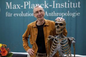 HENDRIK SCHMIDT/DPA VIA ASSOCIATED PRESS
                                Swedish scientist Svante Paabo stands by a replica of a Neanderthal skeleton at the Max Planck Institute for Evolutionary Anthropology in Leipzig, Germany, Monday. Swedish scientist Svante Paabo was awarded the 2022 Nobel Prize in Physiology or Medicine for his discoveries on human evolution.