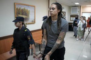 ASSOCIATED PRESS / AUG. 4
                                WNBA star and two-time Olympic gold medalist Brittney Griner is escorted from a court room in Khimki just outside Moscow last month.