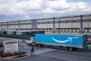 ASSOCIATED PRESS
                                A truck arrives at the Amazon warehouse facility, in the Staten Island borough of New York, April 1. Amazon will hire 150,000 full-time, part-time and seasonal employees across its warehouses ahead of the holiday season.