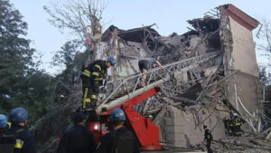UKRAINIAN EMERGENCY SERVICE VIA ASSOCIATED PRESS
                                Rescuers work at the scene of a building damaged by shelling in Zaporizhzhia, Ukraine, today.
