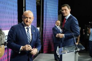 ASSOCIATED PRESS
                                Arizona Democratic Sen. Mark Kelly, left, Republican challenger Blake Masters, right, and Libertarian Marc Victor, back, pause on the stage prior to a televised debate in Phoenix Thursday.