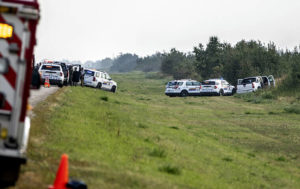 ASSOCIATED PRESS / SEPT. 7
                                Police and investigators gather at the scene where a stabbing suspect was arrested in Rosthern, Saskatchewan on Wednesday, Sept. 7. Canadian police arrested Myles Sanderson, the second suspect in the stabbing deaths of multiple people in Saskatchewan, after a three-day manhunt that also yielded the body of his brother fellow suspect, Damien Sanderson.