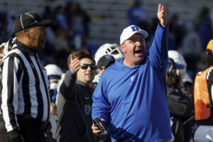ASSOCIATED PRESS
                                Duke head coach Mike Elko points at the video replay board after a holding penalty was called against his team on Saturday.
