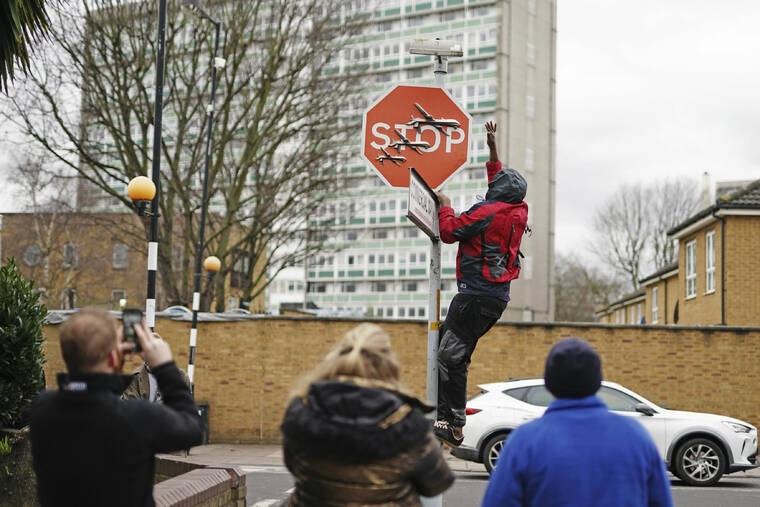Banksy stop sign taken from London street soon after it appears