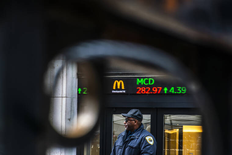 Wall Street sinks on rate worries