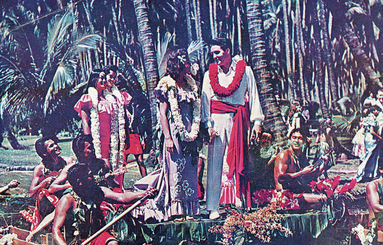 COURTESY HOLLYWOOD MOVIE TOURS
                                One of the most famous movie wedding sequences of all time was filmed on the lagoons at Coco Palms Resort in the 1961 film Blue Hawaii, with Elvis Presley and Joan Blackman playing the happy couple. Presley sang an English translation of The Hawaiian Wedding Song.